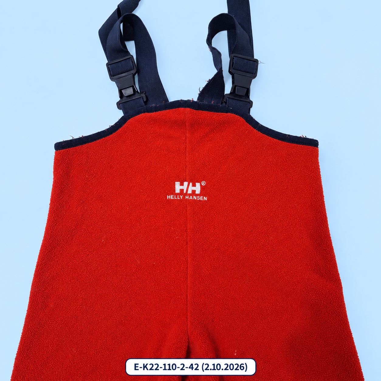 Červené fleecové kalhoty s laclem Helly Hansen – vel. 110