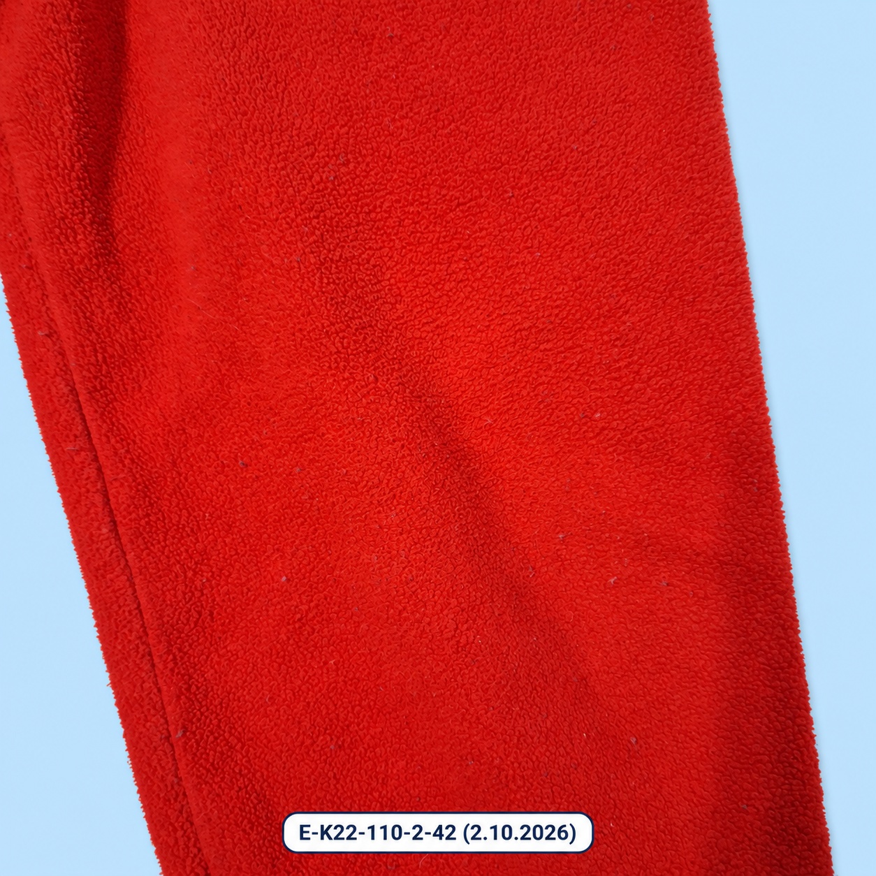 Červené fleecové kalhoty s laclem Helly Hansen – vel. 110